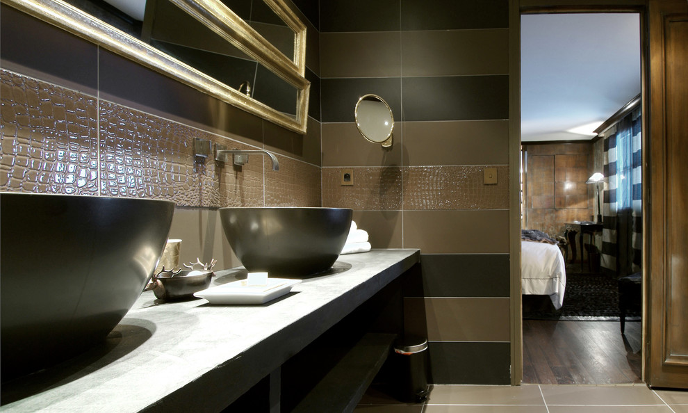 Photo of a contemporary master bathroom in Frankfurt with brown walls, a vessel sink and concrete benchtops.