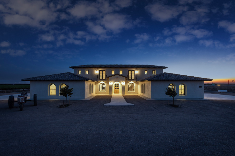 Front Elevation at Night | Tuscan Farmhouse
