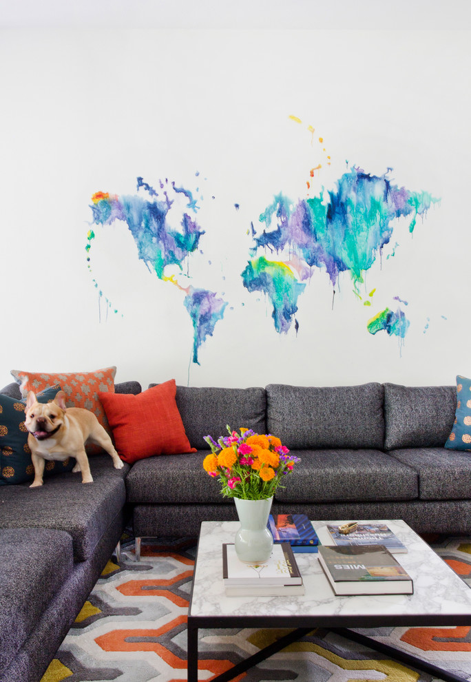 This is an example of a transitional living room in Austin with multi-coloured walls.