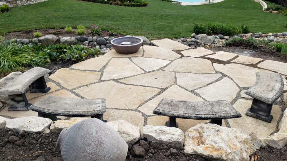 Landscape Transformation with Putting Green and Seating Area