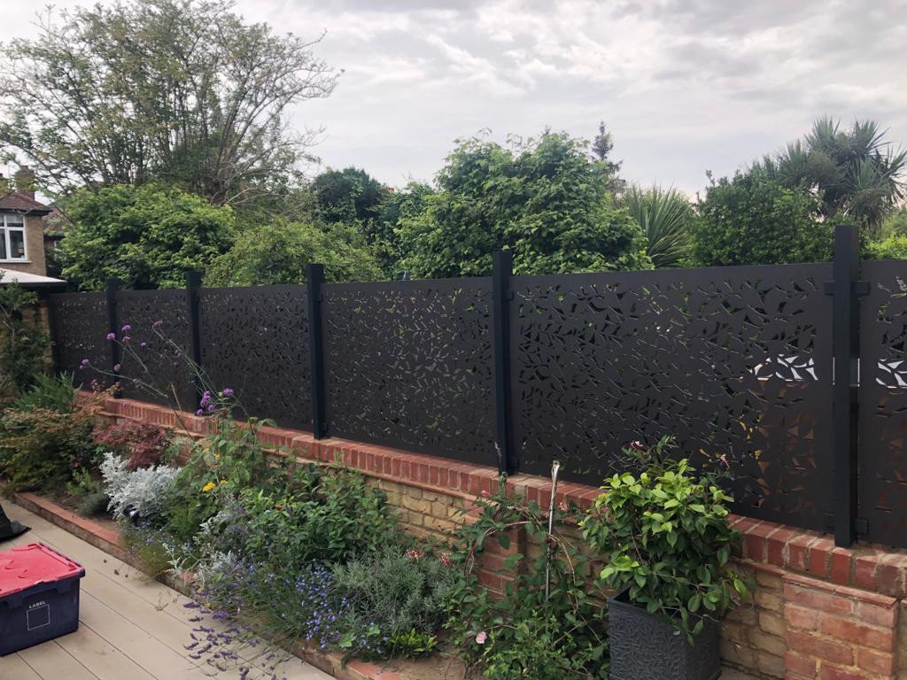 London garden with aluminium powder coated branch fencing