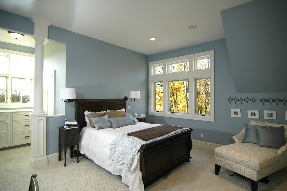 Inspiration for a country master bedroom in Grand Rapids with blue walls, carpet and beige floor.