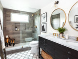 Farmhouse Bathroom by Juxtaposed Interiors