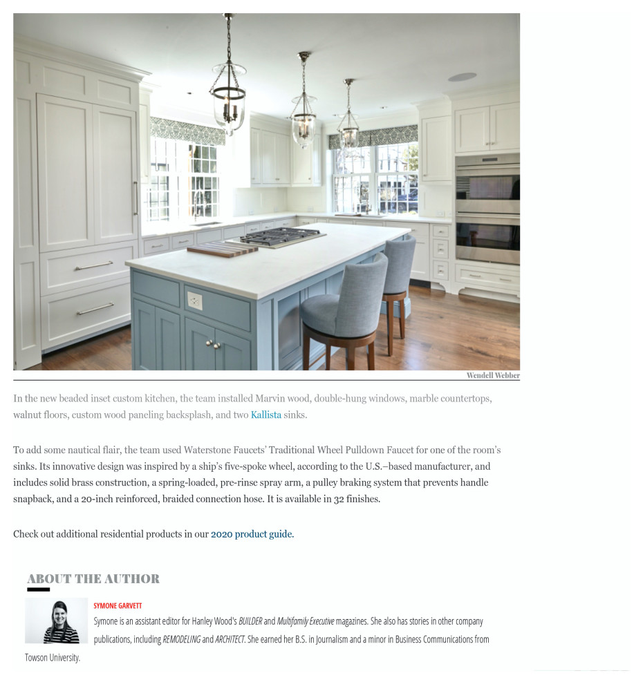 Mid-sized transitional l-shaped dark wood floor, brown floor and wallpaper ceiling open concept kitchen photo in Boston with an undermount sink, recessed-panel cabinets, white cabinets, marble countertops, white backsplash, window backsplash, stainless steel appliances, an island and white countertops