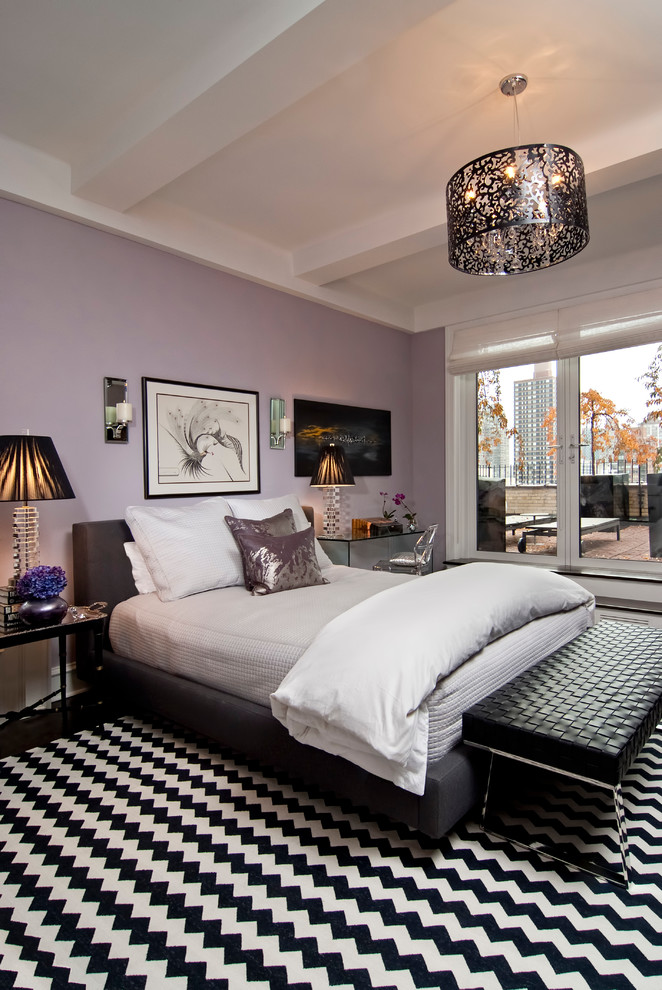 Photo of a contemporary bedroom in New York with purple walls.