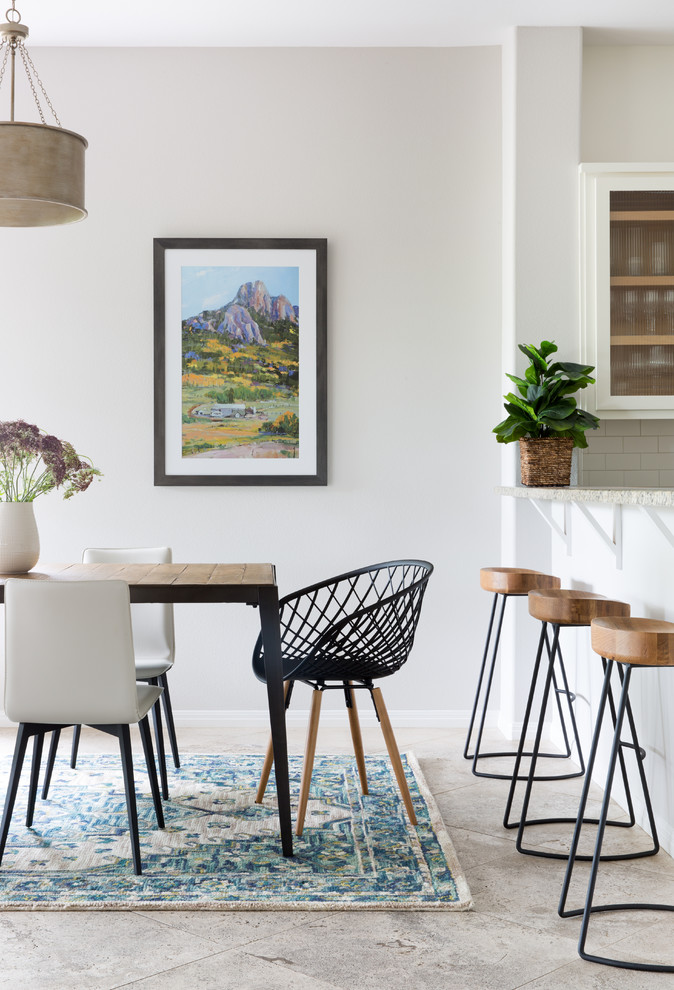 Kitchen/dining room combo - transitional gray floor kitchen/dining room combo idea in Austin with gray walls