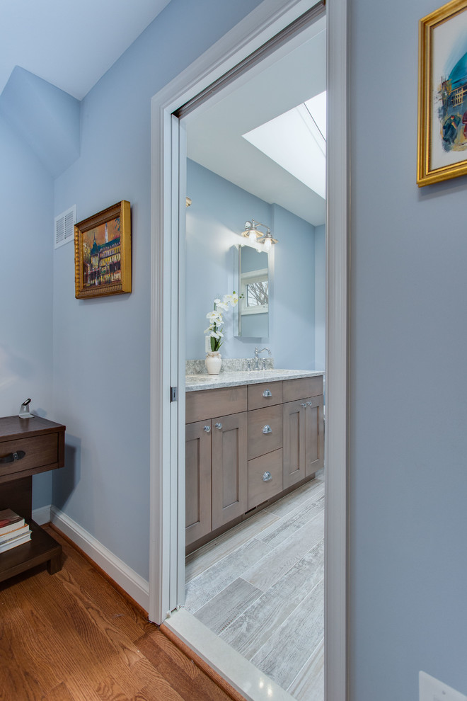 Photo of a small transitional master bathroom in DC Metro with shaker cabinets.