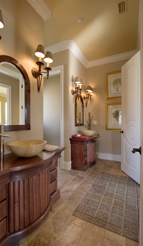 Traditional bathroom in Orlando with a vessel sink.