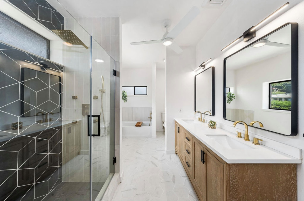 Inspiration for a large timeless master black tile and ceramic tile ceramic tile, white floor and double-sink bathroom remodel in New York with shaker cabinets, light wood cabinets, a one-piece toilet