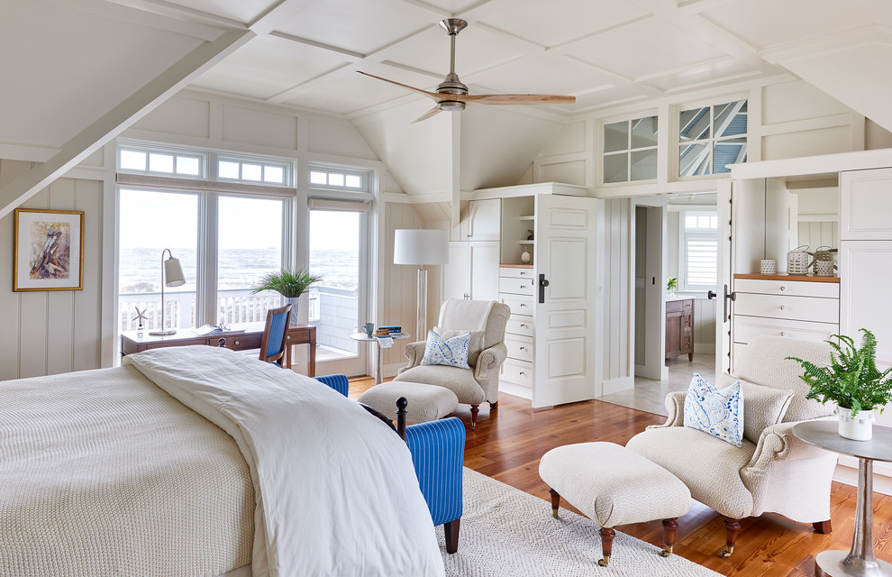 Photo of a beach style bedroom in Raleigh.