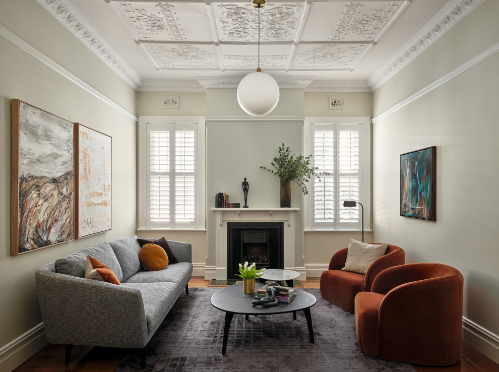 Inspiration for a mid-sized transitional formal enclosed living room in Sydney with a standard fireplace and a wood fireplace surround.