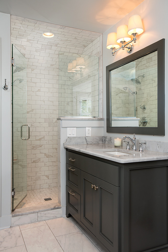 This is an example of a small country master bathroom in Nashville with grey cabinets, a freestanding tub, a corner shower, gray tile, ceramic tile, grey walls, ceramic floors, an undermount sink, quartzite benchtops and recessed-panel cabinets.
