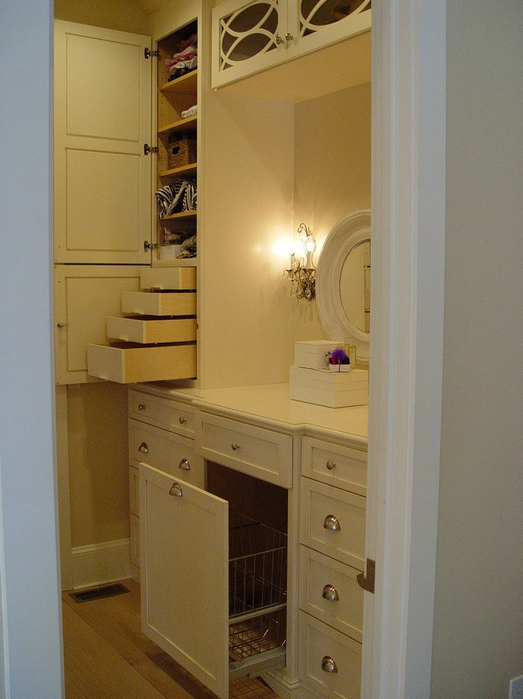 Inspiration for a large traditional women's dressing room in Providence with shaker cabinets, white cabinets and carpet.