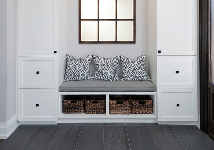 Foyer - small transitional ceramic tile foyer idea in Toronto with beige walls and a black front door
