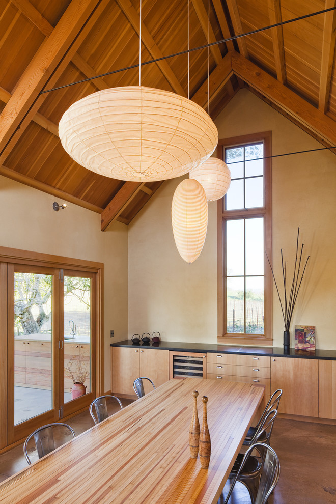 Design ideas for a mid-sized country kitchen/dining combo in San Francisco with beige walls.