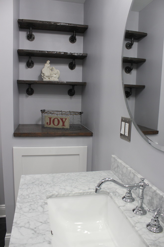 Inspiration for a mid-sized industrial kids bathroom in New York with shaker cabinets, white cabinets, an alcove shower, a two-piece toilet, gray tile, ceramic tile, grey walls, slate floors, an undermount sink, marble benchtops, grey floor, a sliding shower screen and yellow benchtops.
