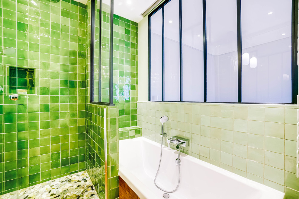 Small transitional master bathroom in Paris with an alcove shower, green tile, terra-cotta tile, green walls, light hardwood floors, a drop-in sink, wood benchtops, brown floor, a hinged shower door and brown benchtops.
