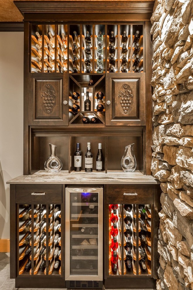 Design ideas for a traditional wine cellar in Vancouver with storage racks.
