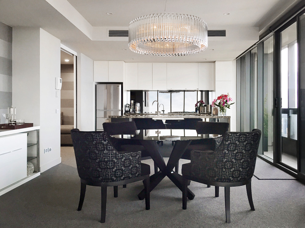 Small modern open plan dining in Melbourne with grey walls, carpet, no fireplace and grey floor.