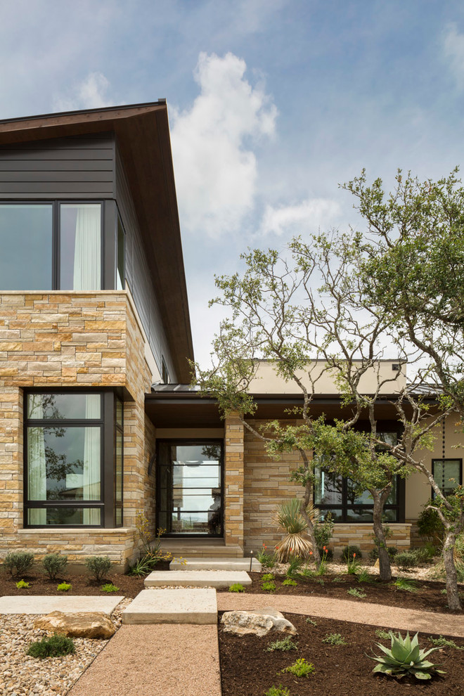 Contemporary front door in Austin with a single front door and a glass front door.