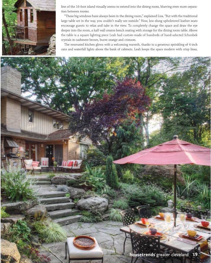 Design ideas for a transitional backyard partial sun formal garden in Cleveland with a fire feature and natural stone pavers.