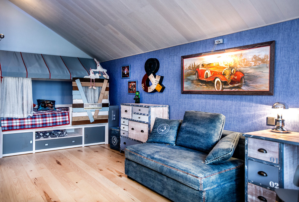 Photo of an eclectic kids' bedroom for kids 4-10 years old and boys in Moscow with blue walls, medium hardwood floors and brown floor.