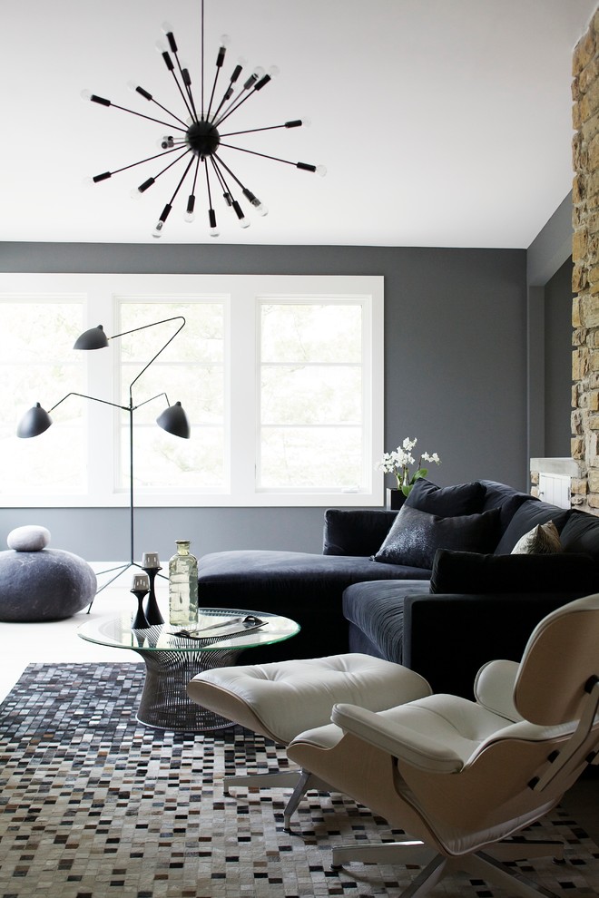 Inspiration for a contemporary family room in Raleigh with grey walls.