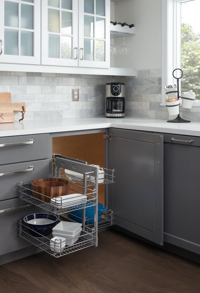Transitional dark wood floor eat-in kitchen photo in New Orleans with a double-bowl sink, shaker cabinets, gray cabinets, gray backsplash and stainless steel appliances