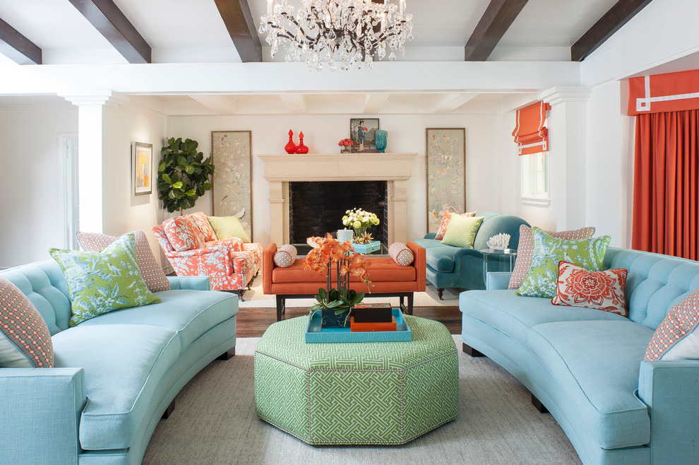 Example of a transitional formal dark wood floor and brown floor living room design in Los Angeles with white walls, a standard fireplace and a stone fireplace