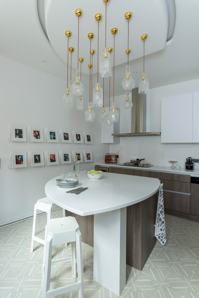 Photo of a large contemporary single-wall separate kitchen in Paris with an undermount sink, beaded inset cabinets, medium wood cabinets, quartzite benchtops, white splashback, engineered quartz splashback, stainless steel appliances, cement tiles, with island, beige floor and white benchtop.
