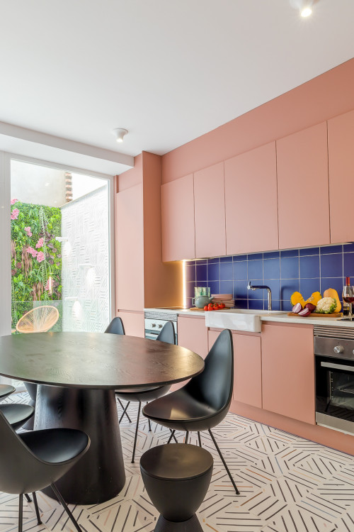 Flat-Panel Fun: Pink Cabinets and Blue Tile Bliss in Your Pastel Kitchen