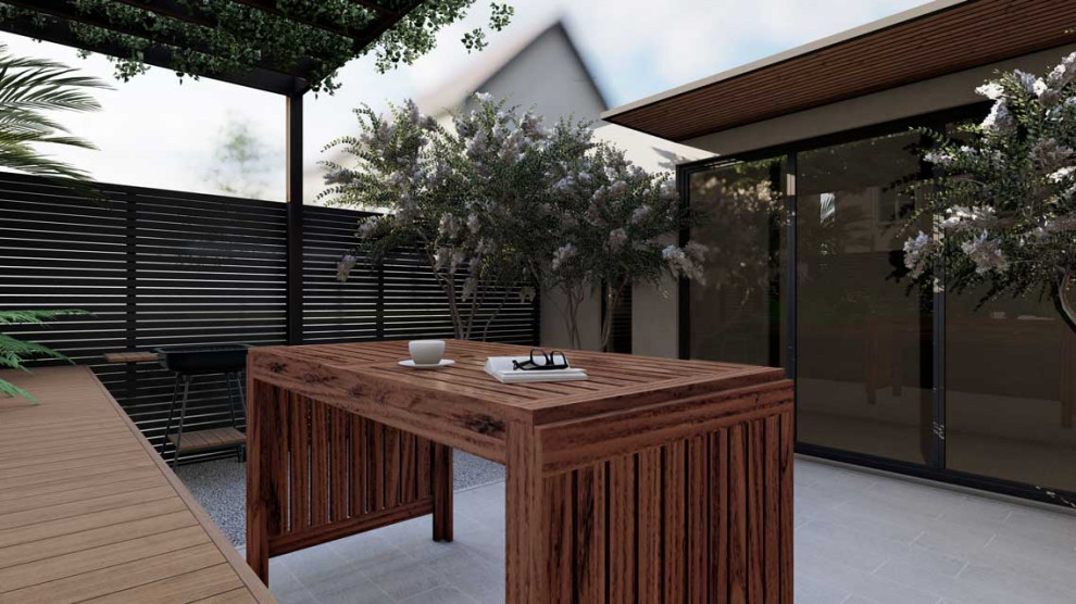 Aménagement d'une petite terrasse contemporaine avec une cour, des pavés en pierre naturelle et une pergola.