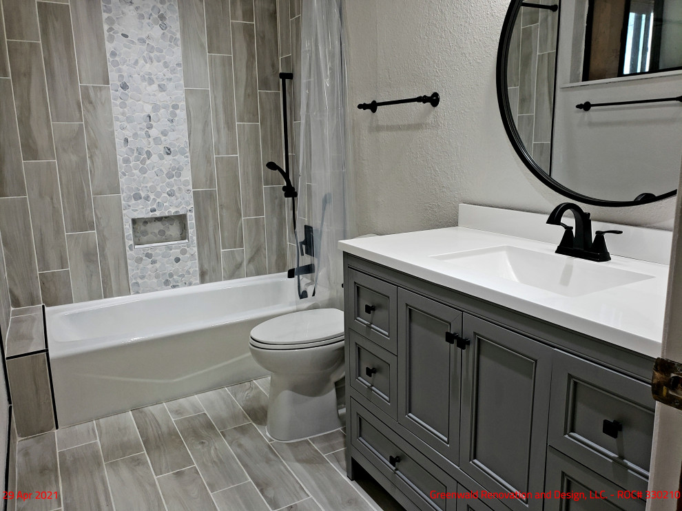 Bathroom - mid-sized contemporary master beige tile and ceramic tile ceramic tile, beige floor and single-sink bathroom idea in Other with recessed-panel cabinets, gray cabinets, a two-piece toilet, white walls, a console sink, solid surface countertops, white countertops and a freestanding vanity