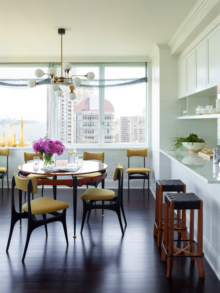 Inspiration for a contemporary open plan dining in New York with white walls and dark hardwood floors.