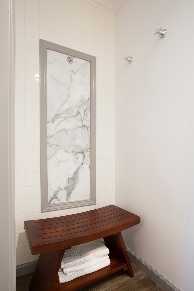 Inspiration for a small transitional master corner shower remodel in Orange County with white walls, a drop-in sink and laminate countertops