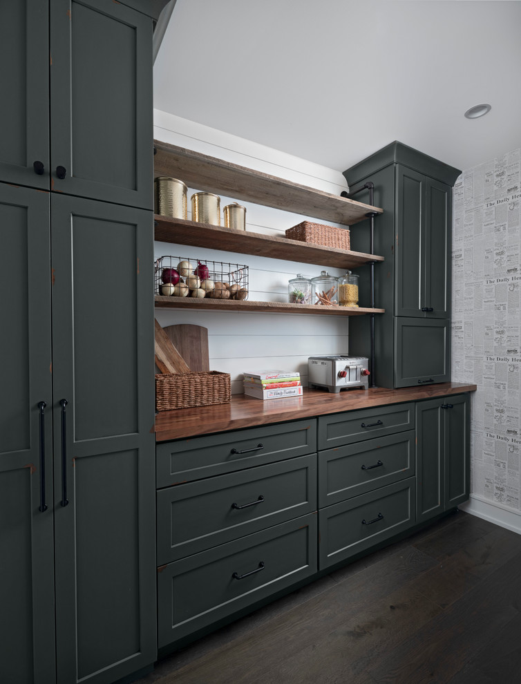 Inspiration for a transitional kitchen pantry in Other with shaker cabinets, wood benchtops, white splashback, dark hardwood floors, brown floor and brown benchtop.