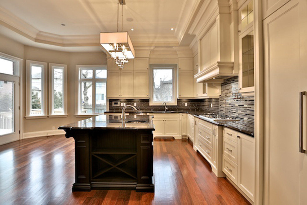 Example of a transitional kitchen design in Toronto