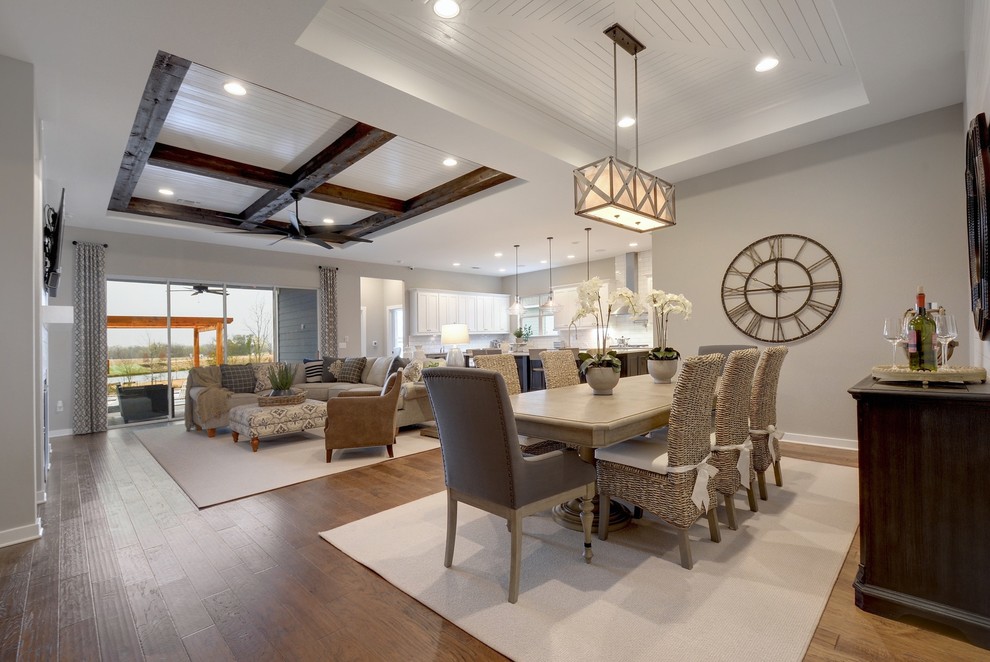 Transitional open plan dining in Jacksonville with grey walls, medium hardwood floors and brown floor.