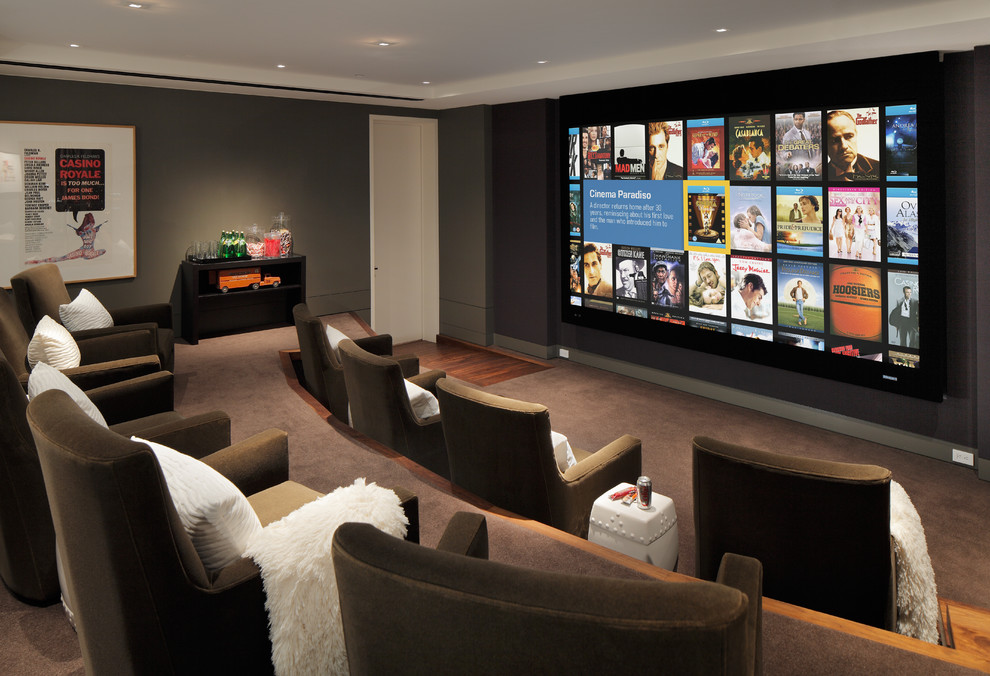 Contemporary home theatre in San Francisco with brown floor.
