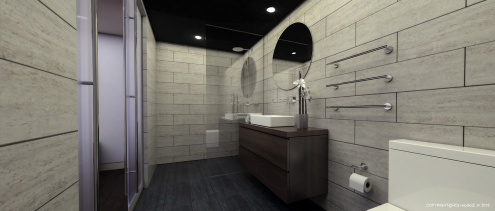 Inspiration for a mid-sized contemporary bathroom in Sydney with furniture-like cabinets, dark wood cabinets, a one-piece toilet, black tile, gray tile and wood benchtops.