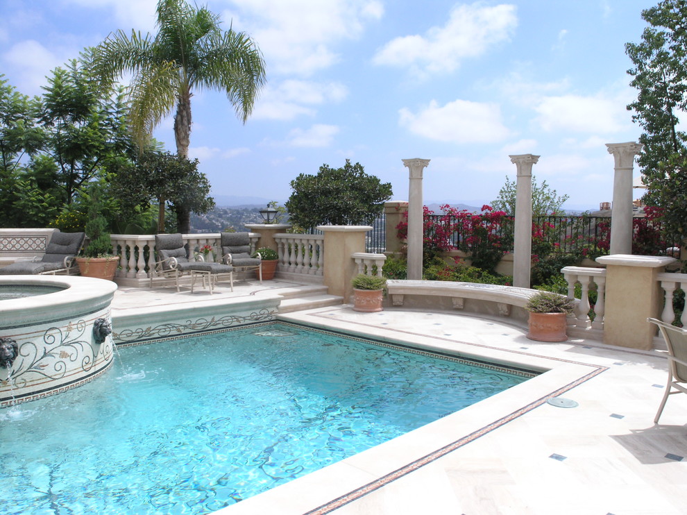 Inspiration for a mediterranean rectangular pool in Los Angeles with a hot tub.