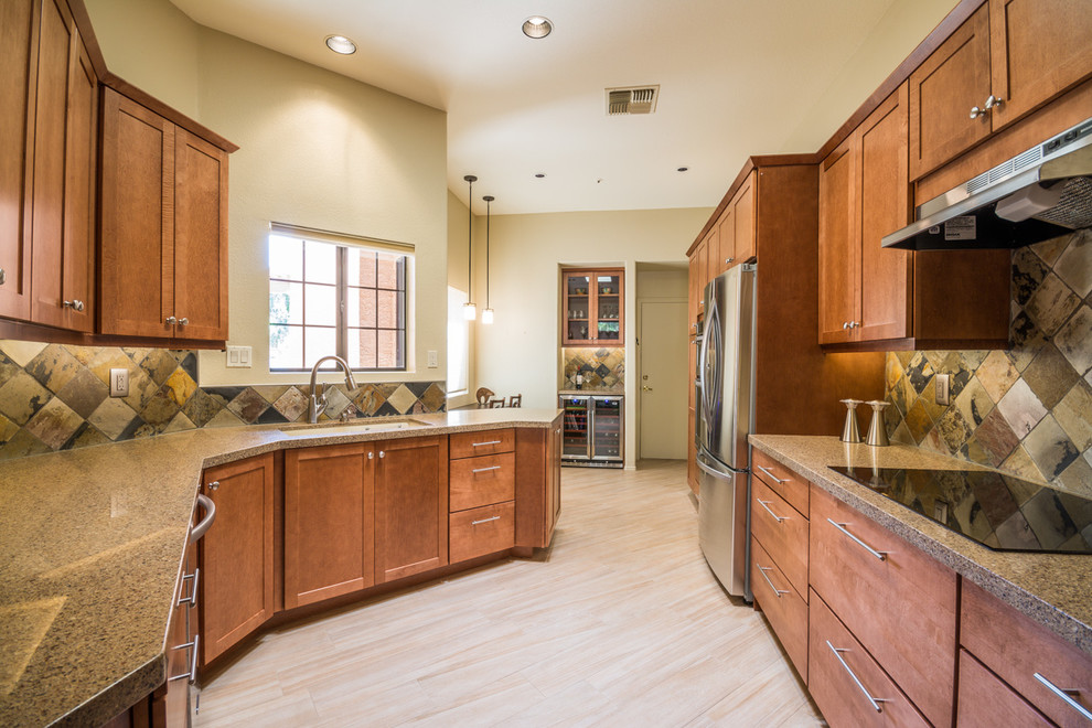 Example of a mid-sized transitional galley kitchen design in Phoenix
