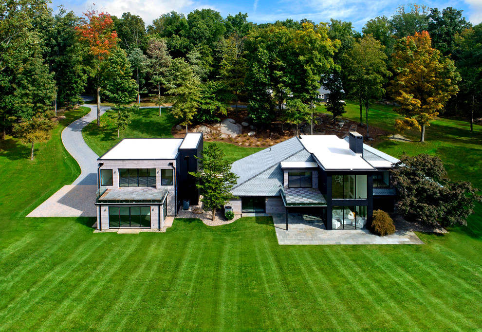 Photo of a large contemporary home design in New York.