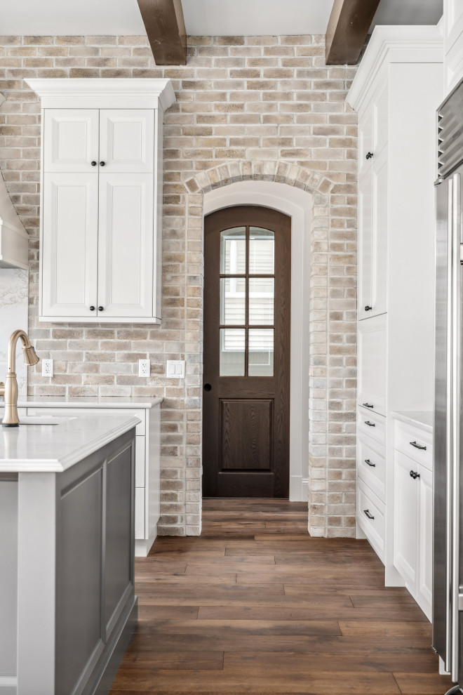 Transitional home design photo in Calgary