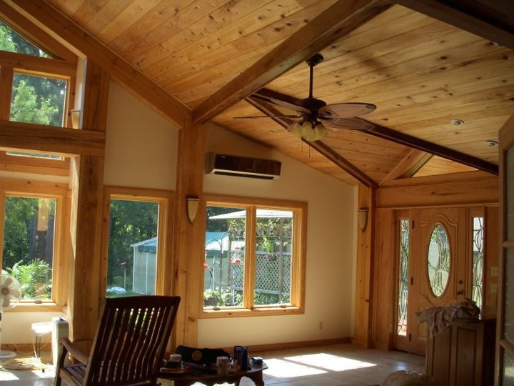 Photo of a large arts and crafts formal open concept living room in Other with white walls, ceramic floors, no tv and beige floor.