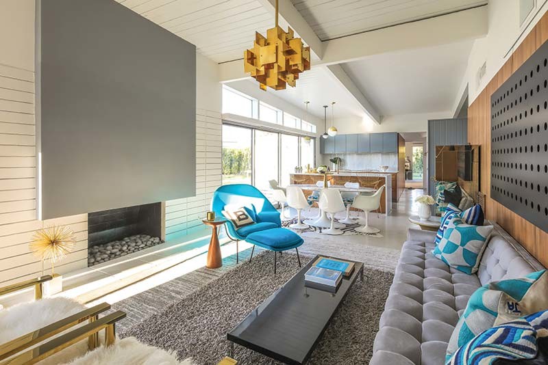 This is an example of a mid-sized midcentury formal open concept living room in Los Angeles with white walls, porcelain floors, no fireplace and no tv.