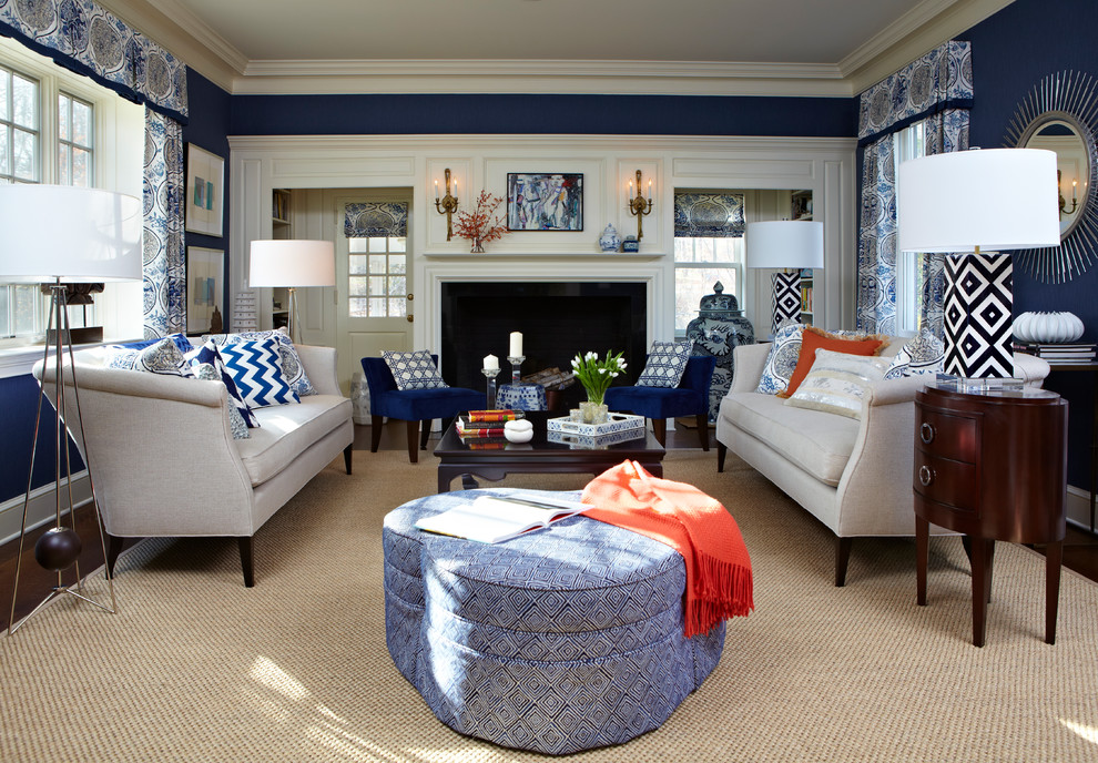 Living room - mid-sized traditional enclosed dark wood floor living room idea in New York with blue walls, a standard fireplace and no tv