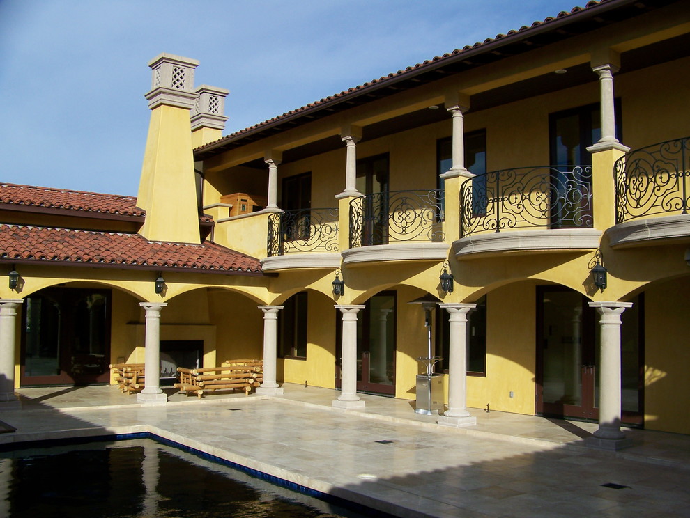 Inspiration for a large mediterranean courtyard rectangular lap pool in San Luis Obispo with tile.