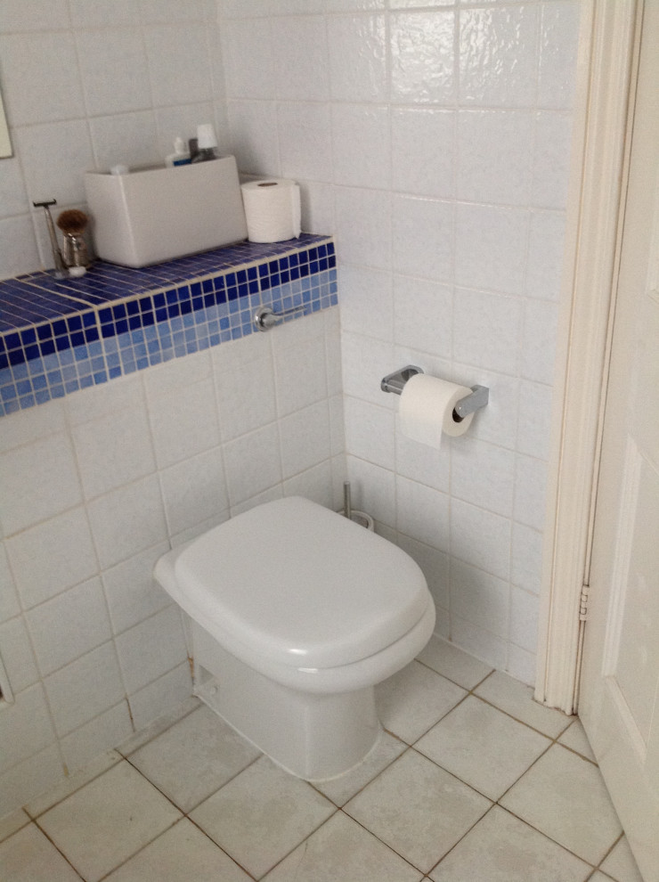 Small bathroom with med grey tiles