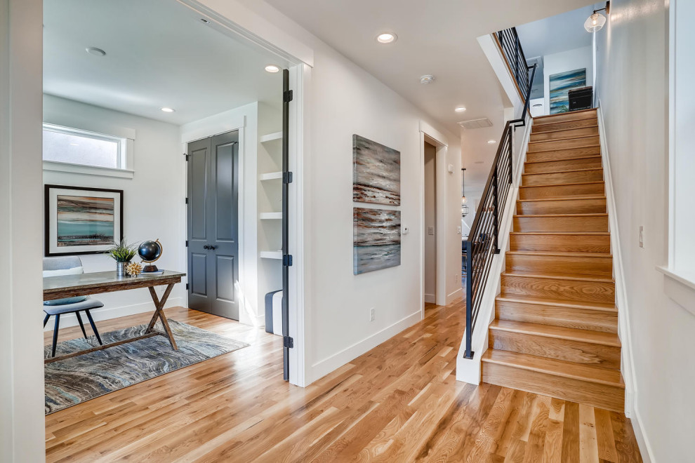 Transitional home design photo in Denver